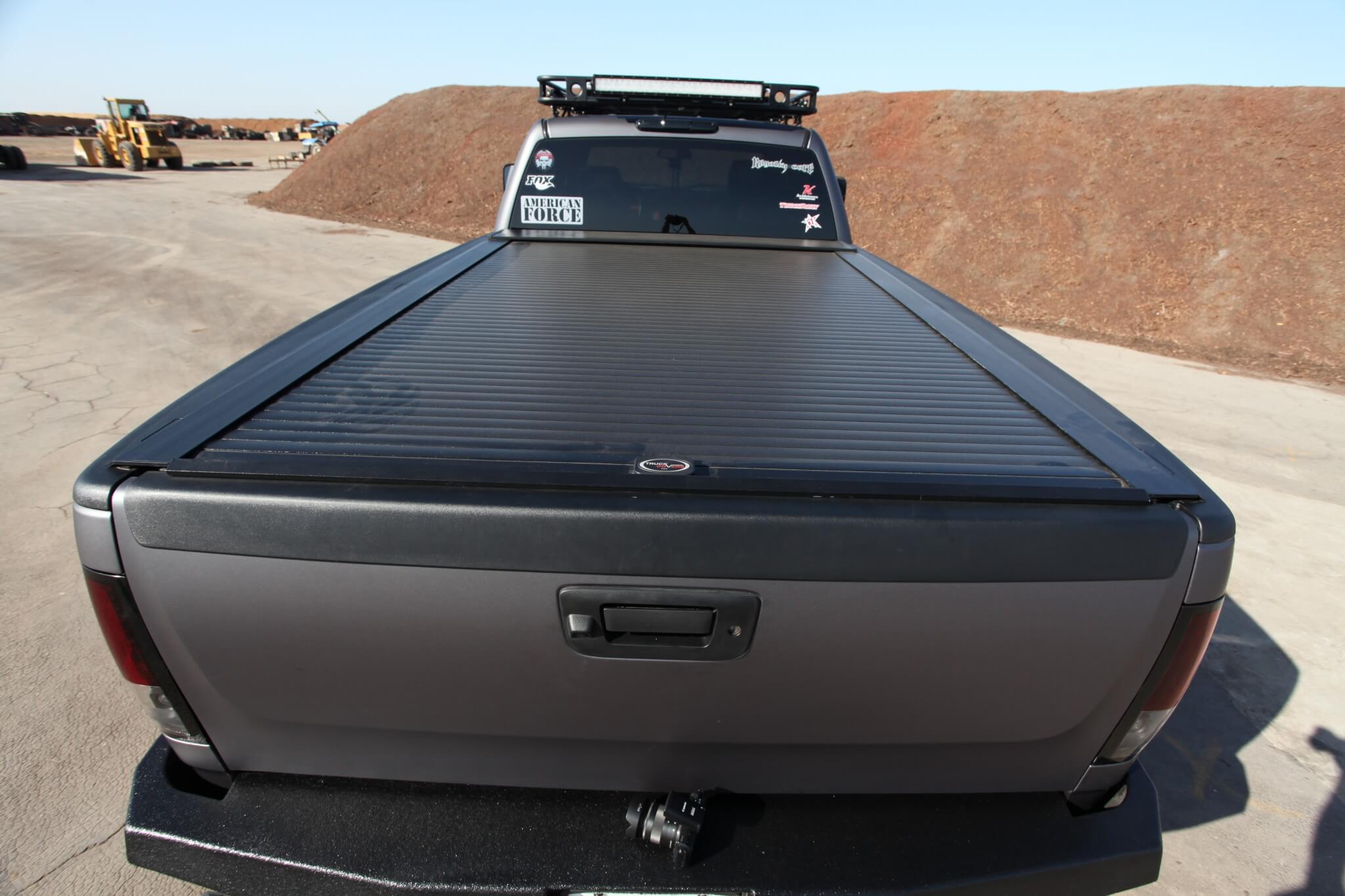 A retractable USA tonneau cover secures the bed’s payload. 