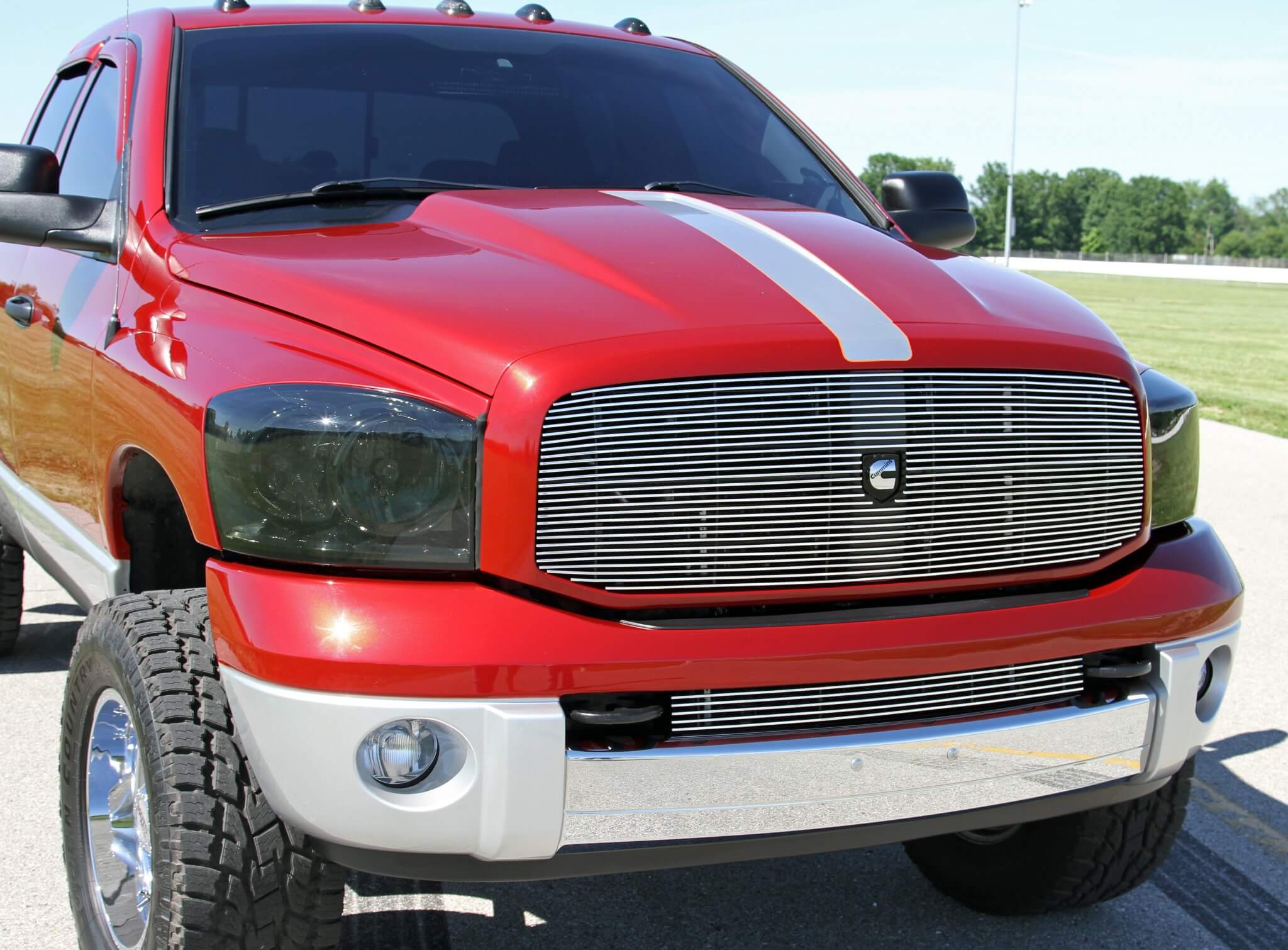 To give his truck a unique look, Nick Chase installed a cowl-style steel hood, Laramie bumper and custom billet grille, and then had the crew at Tom Rose Auto Body work their magic with a two-tone combination that’s brighter and bolder than stock to really make the truck pop. The smoked headlight housings contain 6,000K HID bulbs to illuminate the road at night.