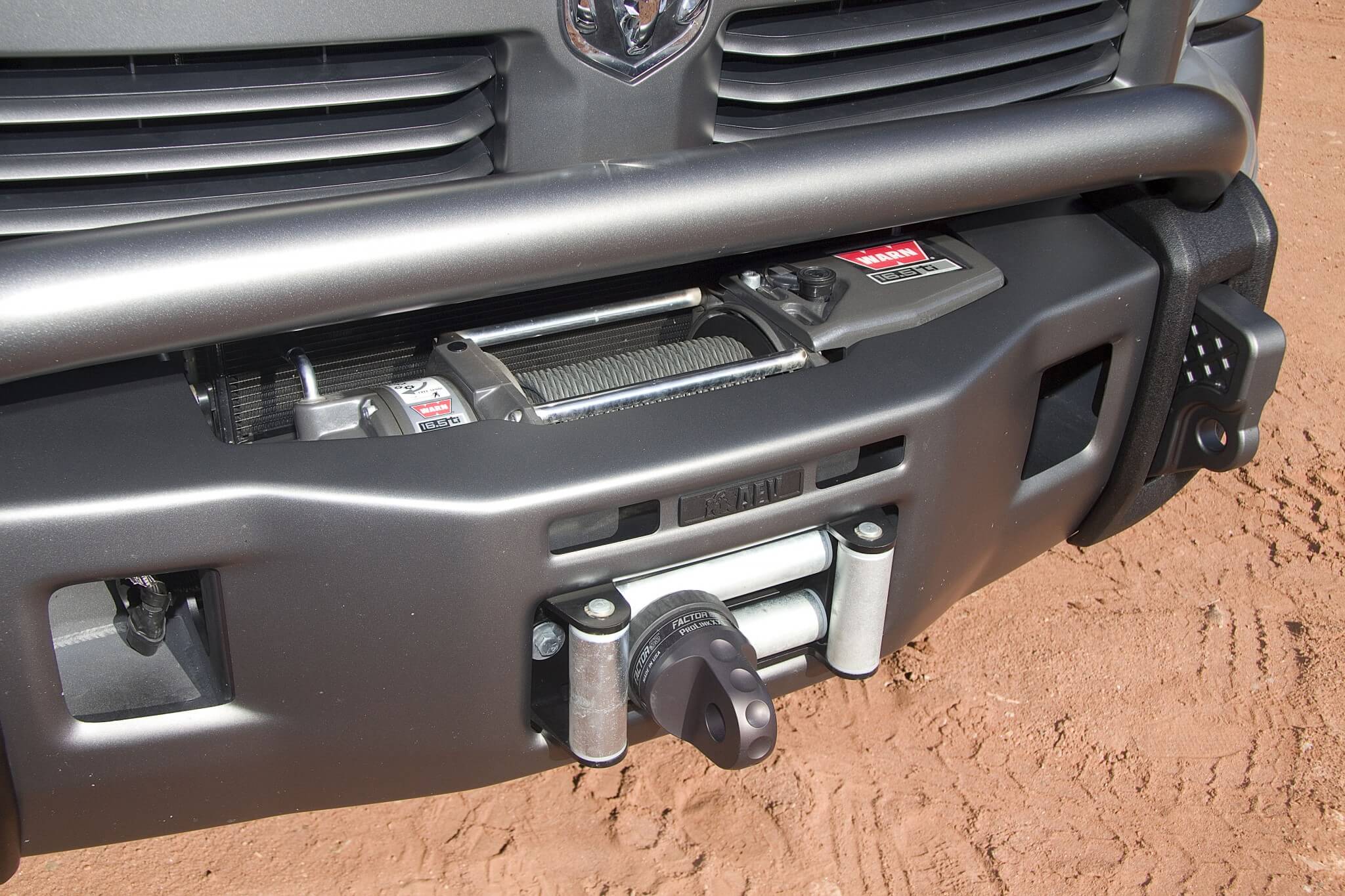 The AEV Ram bumper is capable of fitting a Warn Industries 16.5 Ti winch. This unit has a maximum pull rating of 16,500 lbs., more than enough for this Diesel Ram truck to assist others on the trail. 