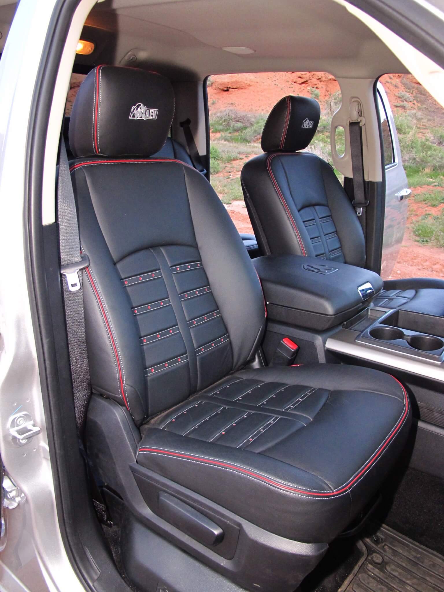 The seats in AEV Ram are custom upholstered with premium leather. The black and red scheme is subtle and looks great. 