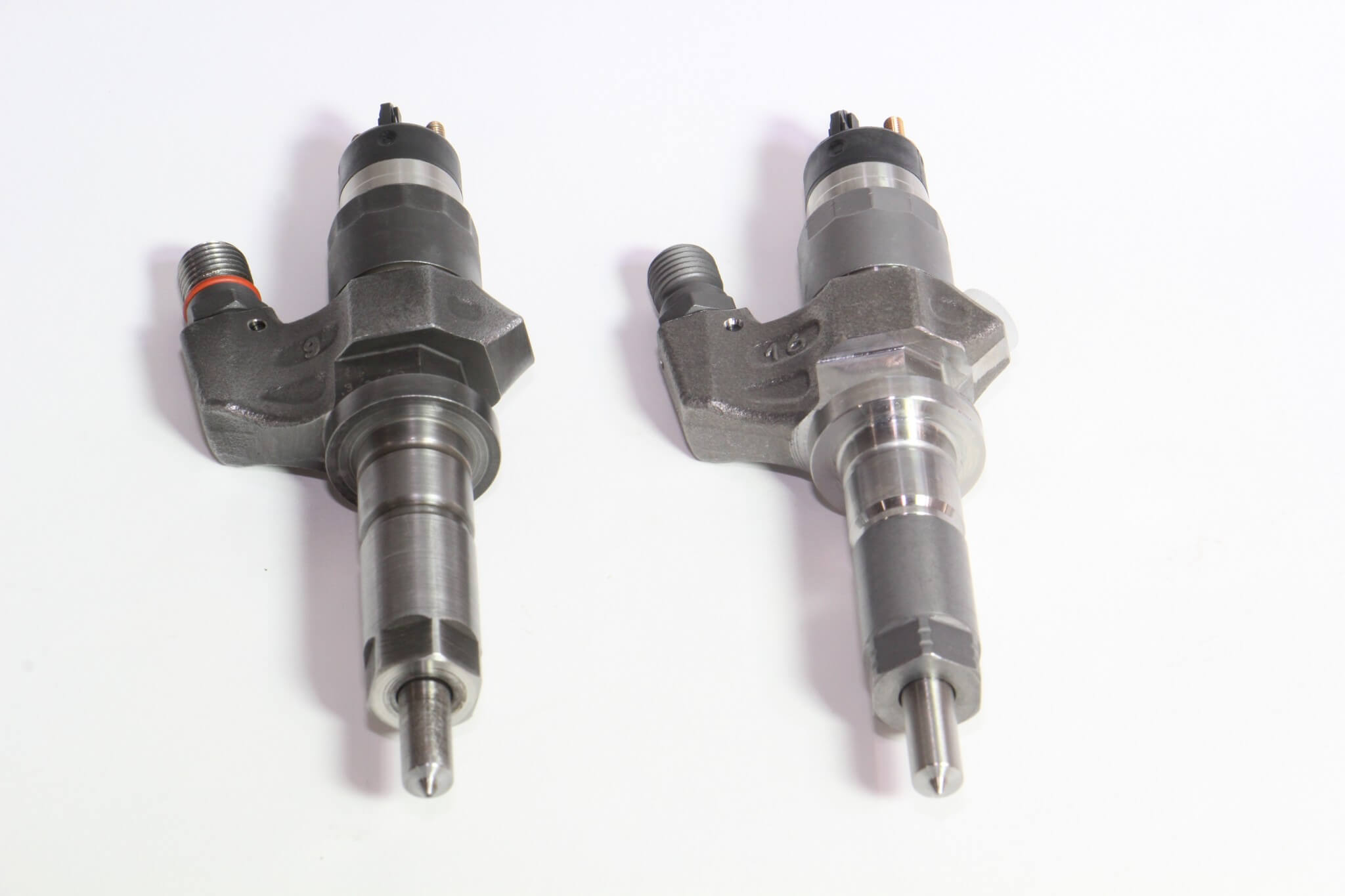12. This image shows the old injector (left) and new Bosch injector (right). Quality is not always visible at first glance, but it’s seen in engine performance right away. Don’t skimp here; all replacement injectors are not the same, as this owner found out the first time around.