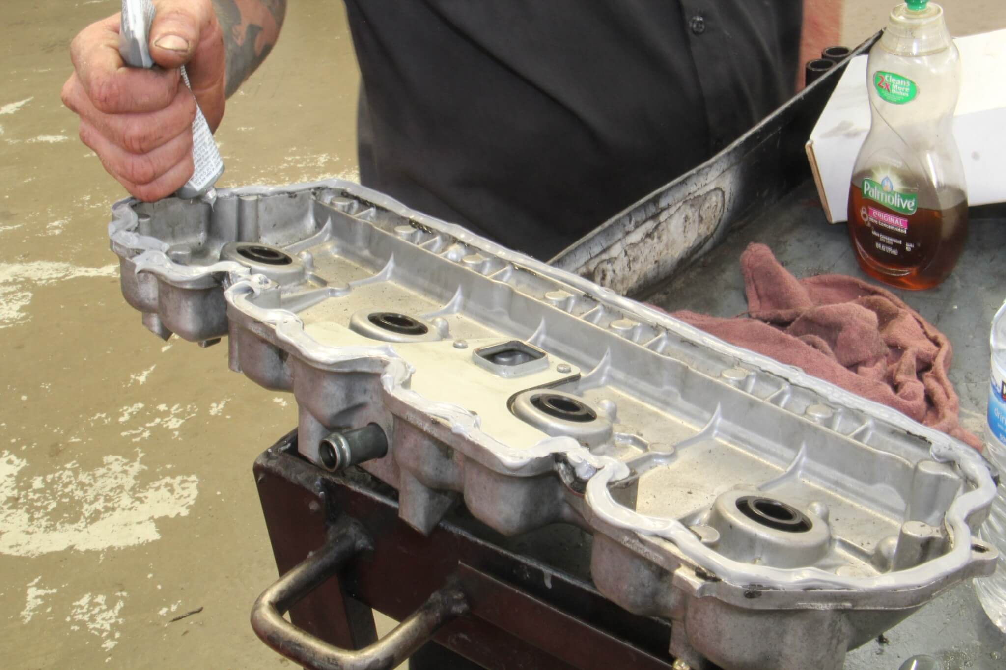 19. Greenberg carefully applied silicone to the upper valve cover mounting surface for a tight seal.