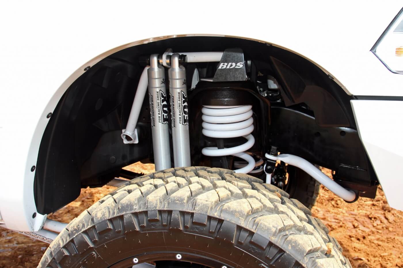 Dual Fox Racing Shox and massive BDS coil springs are used at the front corners of the Ram.