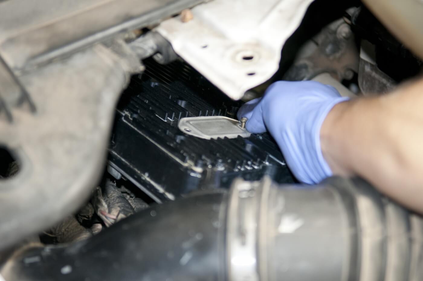 1. The FICM on this F-350 is mounted over the driver’s side valve cover. Before taking the FICM out of the truck, remove the service cover and do a diagnostic test (as outlined in the truck’s service manual) to see if it’s actually bad.