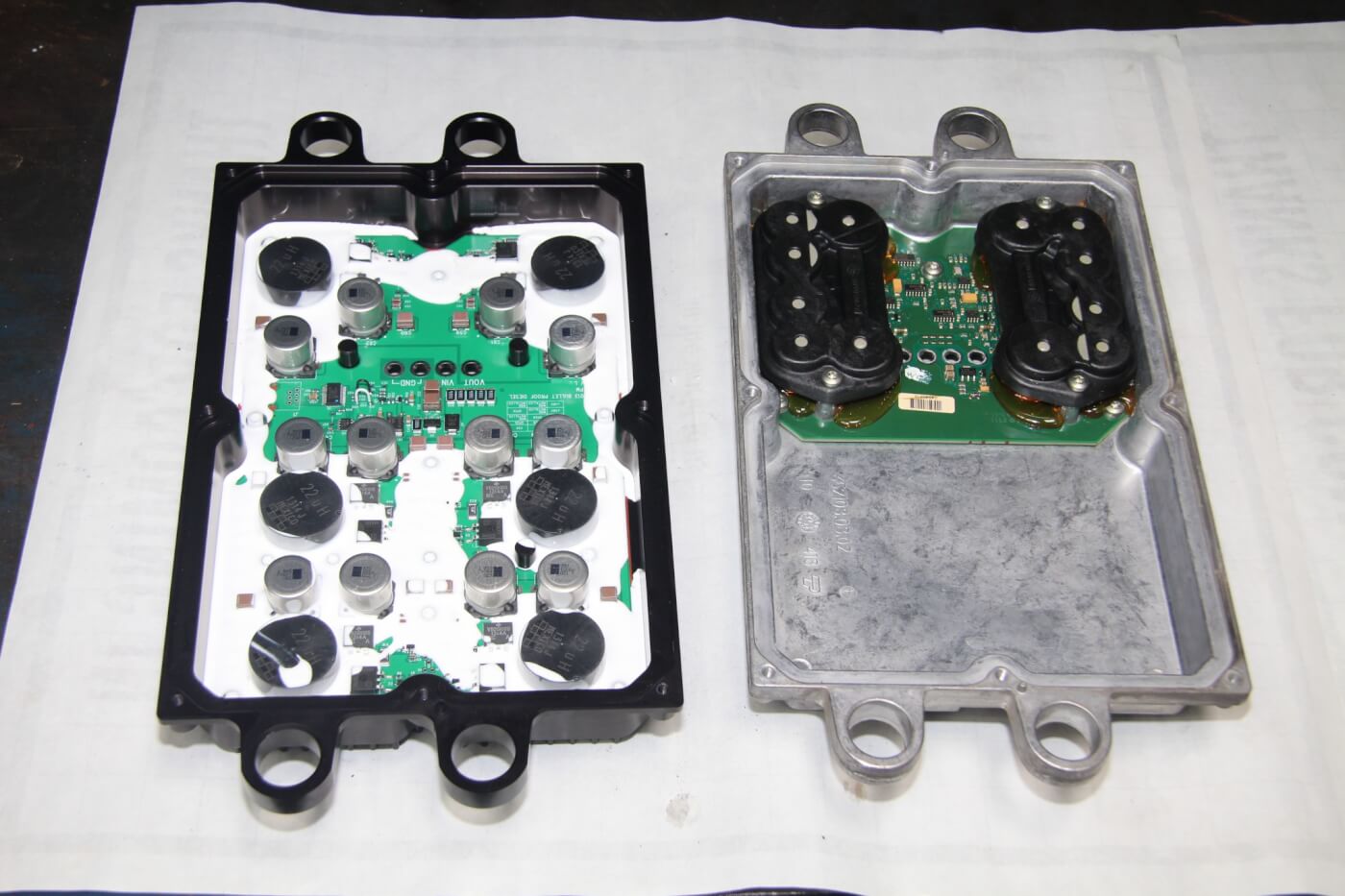 8. Here we see the Bullet Proof FICM power supply on the left and the OEM unit on the right. The Bullet Proof part seen here has the six-phase upgrade. Both four- and six-phase Bullet Proof power supplies are superior to the OEM unit.