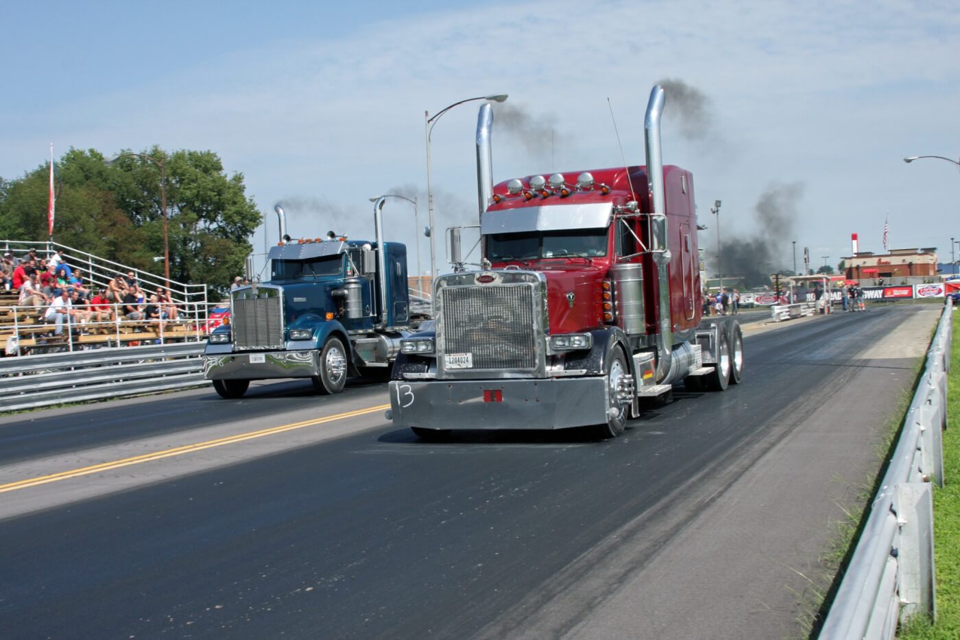 Robby Patterson and his maroon Peterbilt took the win Sunday over Josh Hubbard and his blue Kenworth in the Big Rig class.