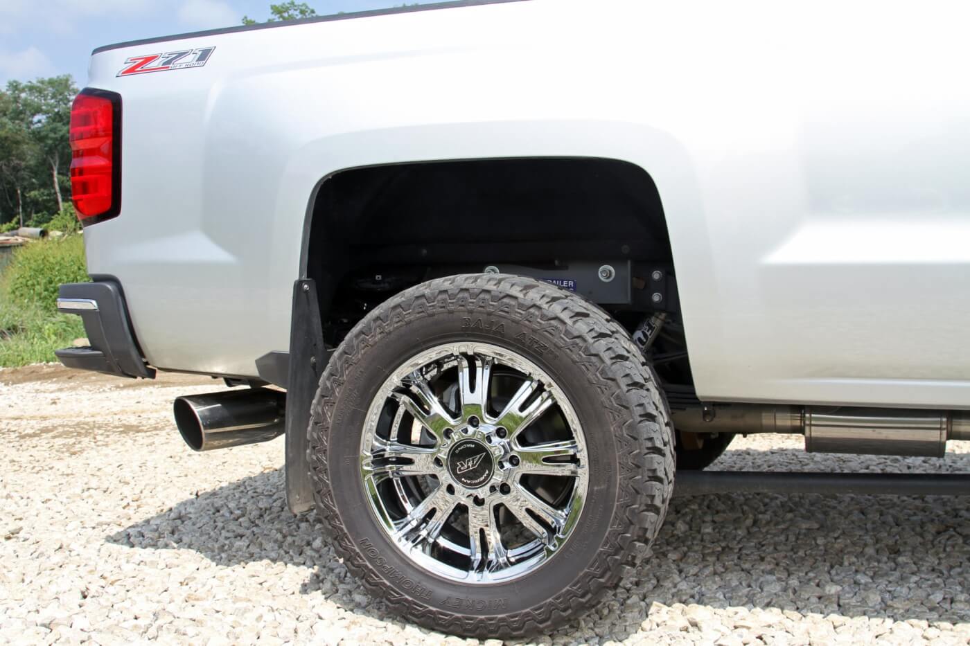 Randall ditched the factory rims for a set of 20x9 American Racing AR708 wheels. LT305/55R20 Mickey Thompson Baja ATZ P3 tires provide good grip on and off the pavement.