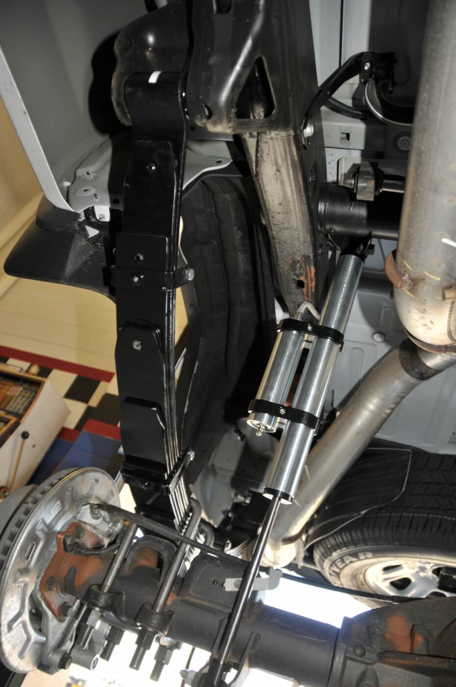 20. Here’s a look at the complete rear suspension. New U-bolts and plates are included in the kit.