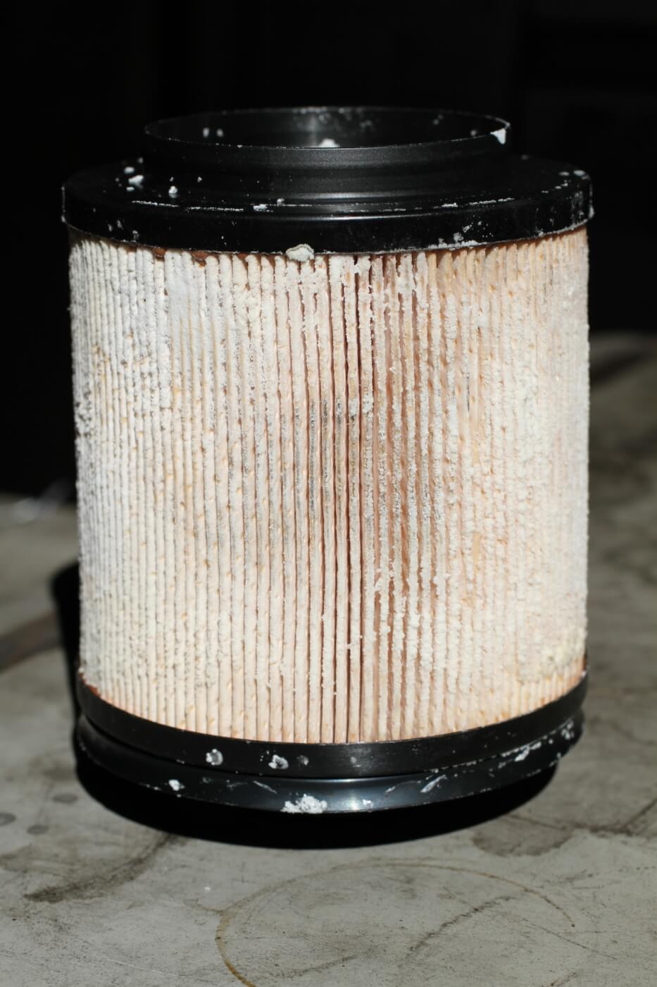 10. Here you see a fuel filter that’s encrusted with urea crystals from DEF. This is a sure sign of DEF contamination in the fuel. 