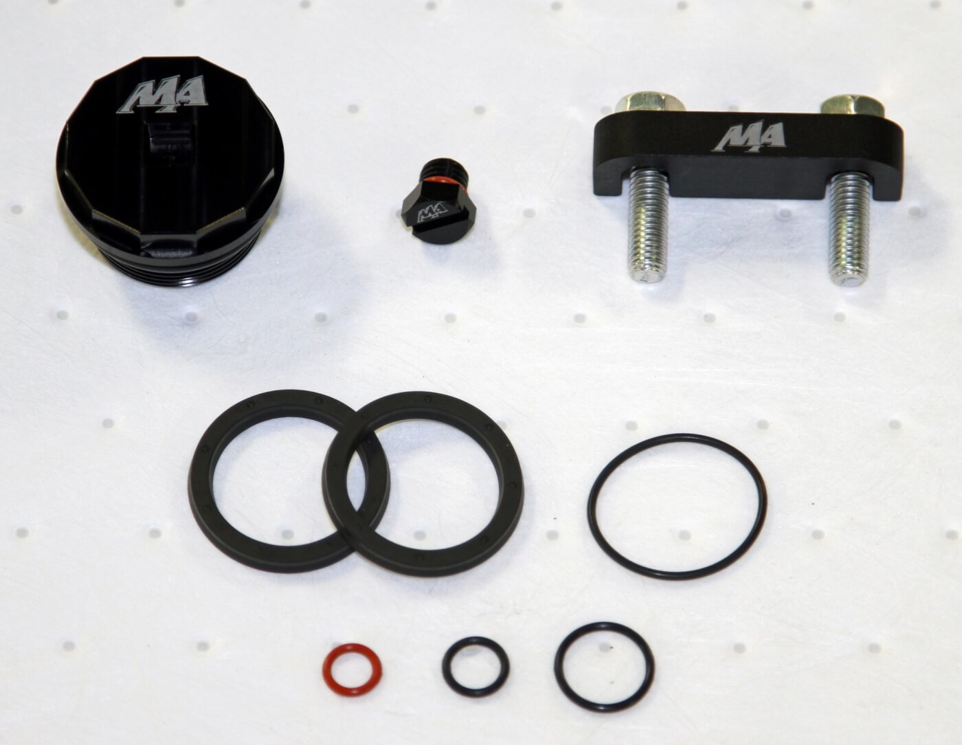 1. Merchant Automotive's Master Filter Head Kit includes everything seen here as well as a new OEM fuel filter.