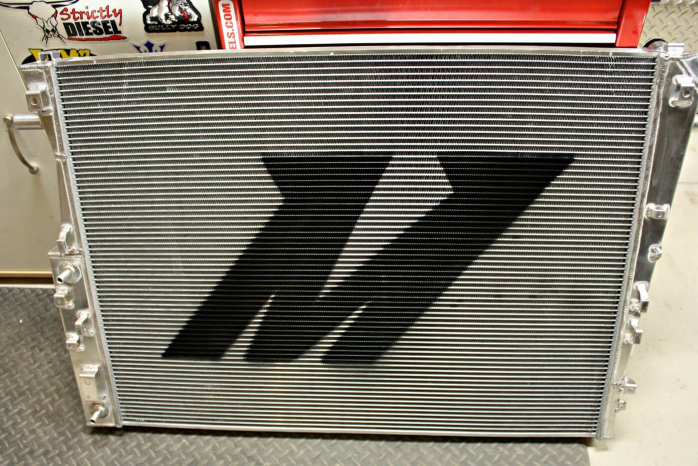 11. The new Mishimoto radiator features full-aluminum construction with TIG welded end tanks to prevent leakage issues that are known to plague the factory unit. Along with its more robust construction, the Mishimoto unit also adds capacity, holding 1.25 gallons more than the stock radiator. The increased capacity and core design aid in heat dissipation for improved cooling efficiency.