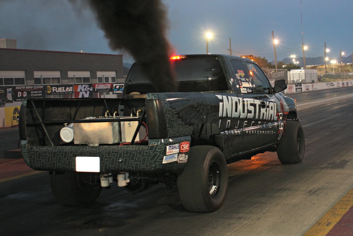 Industrial Injection debuted their latest creation for the drag strip: a dedicated LB7 Duramax-powered drag truck, complete with its rear-mounted fuel cell and fiberglass front clip. Lead engine tech Shawn Baca pushed this 1,500-hp twin-turbo nitrous-injected machine into the low 10s before breaking the drivetrain in the final round.