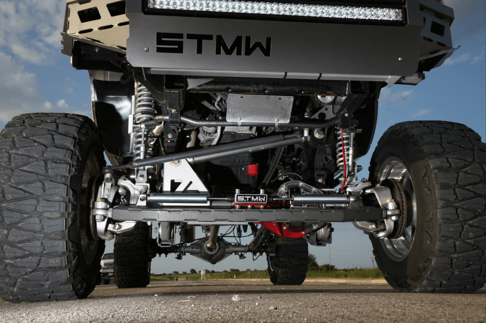 The Naivars put a lot of work into the front suspension and steering gear to ensure the Silverado would steer accurately, even with a solid front axle and a 12-inch lift. "I like things to work right," explains brother Brandon.