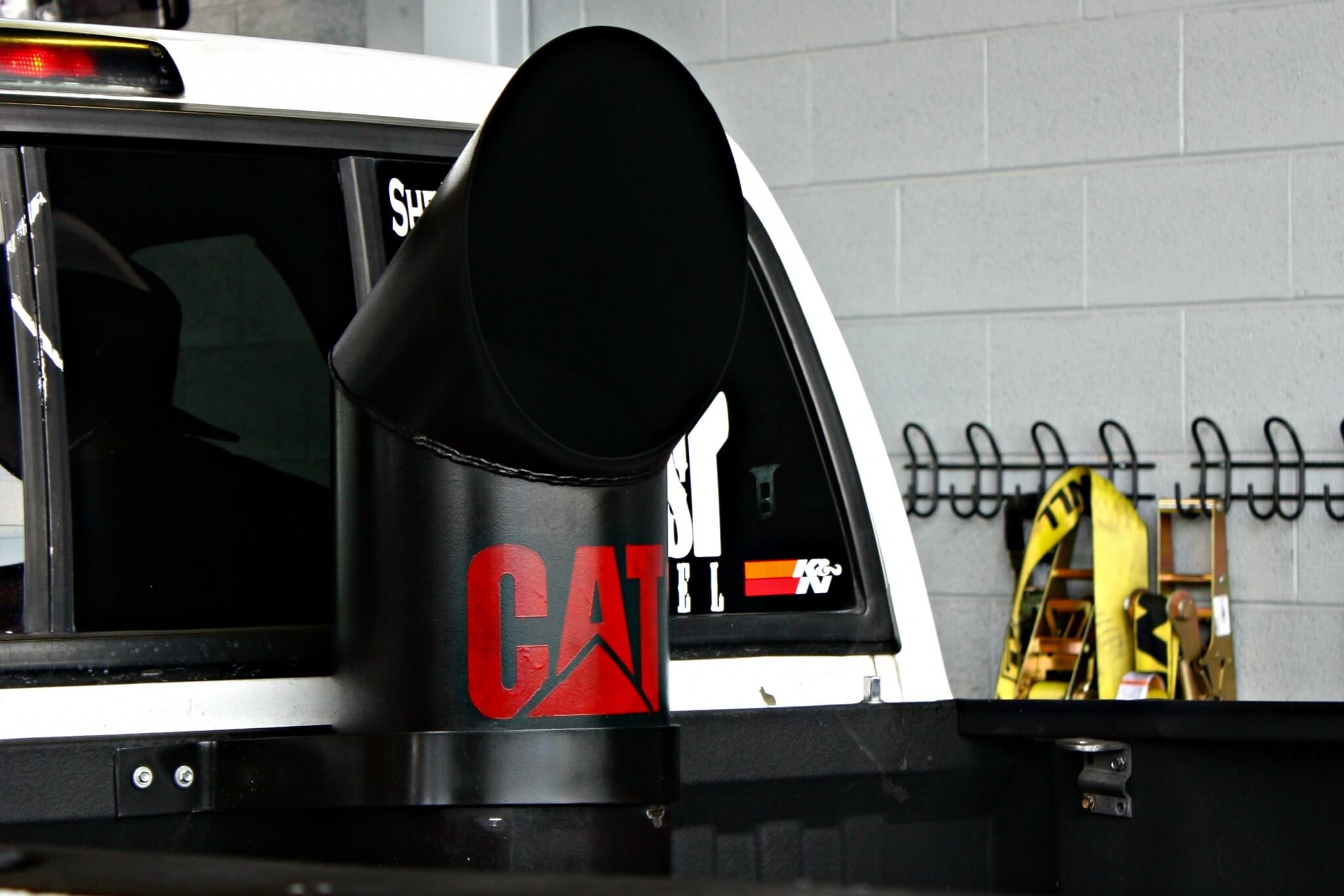 A Cummins diesel with a Caterpillar sticker? Well, the stack came off of a Caterpillar dozer, so that makes it legal to run the decal, right?