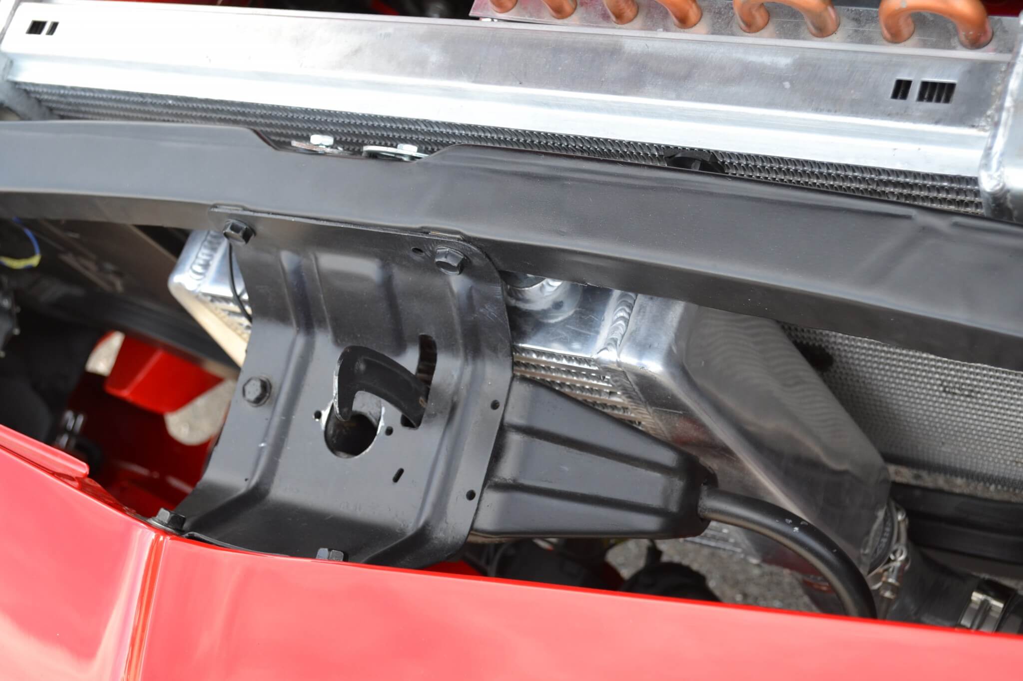 Since the stock intercooler obviously wouldn't fit behind the Camaro grille, a CXRacing universal intercooler was mounted to cool the air exiting the turbocharger.