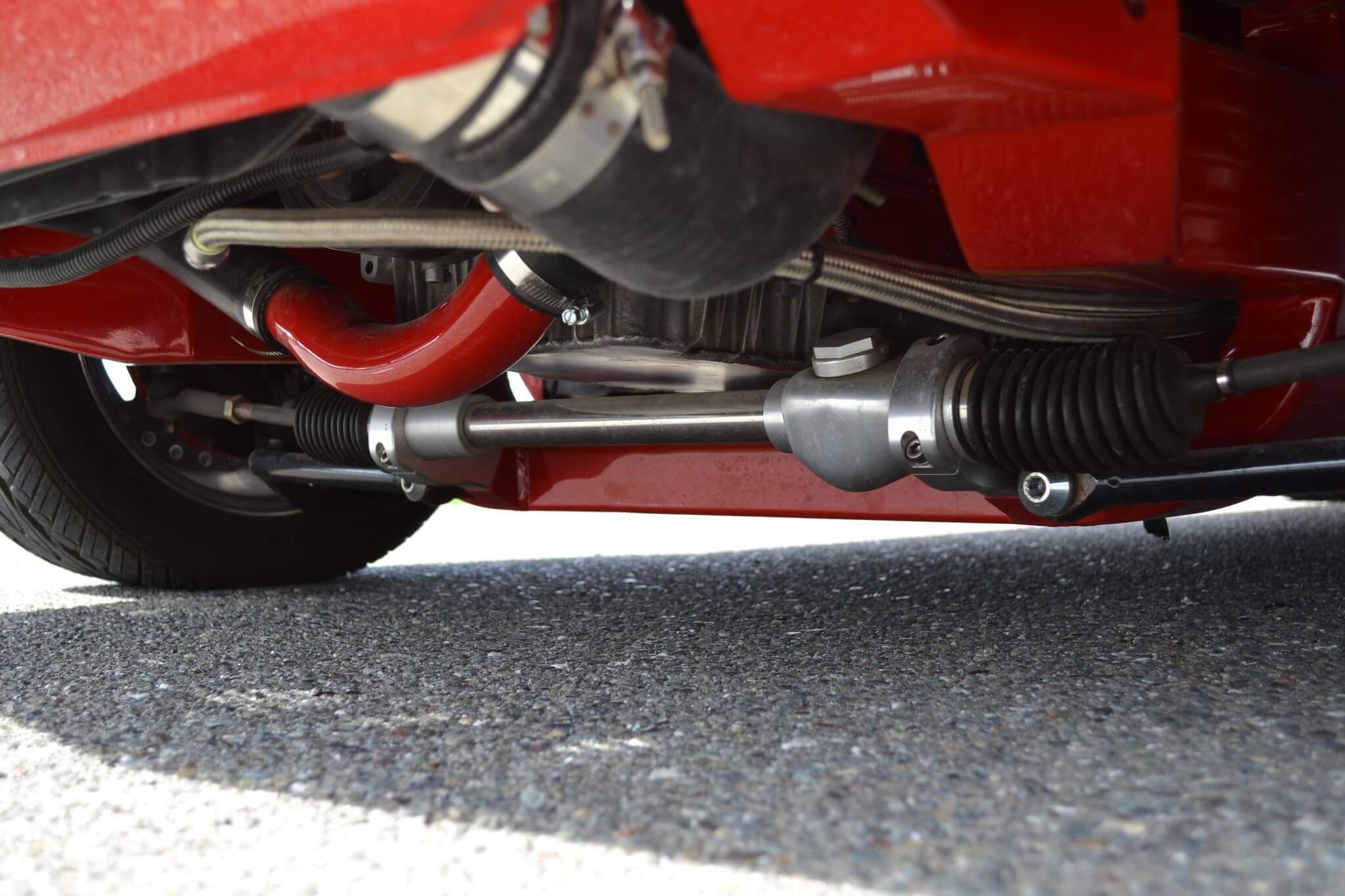 The front suspension of the Camaro is a bolt-on G-Force front clip that was installed by Hamm, and tied in to the rear frame rails.