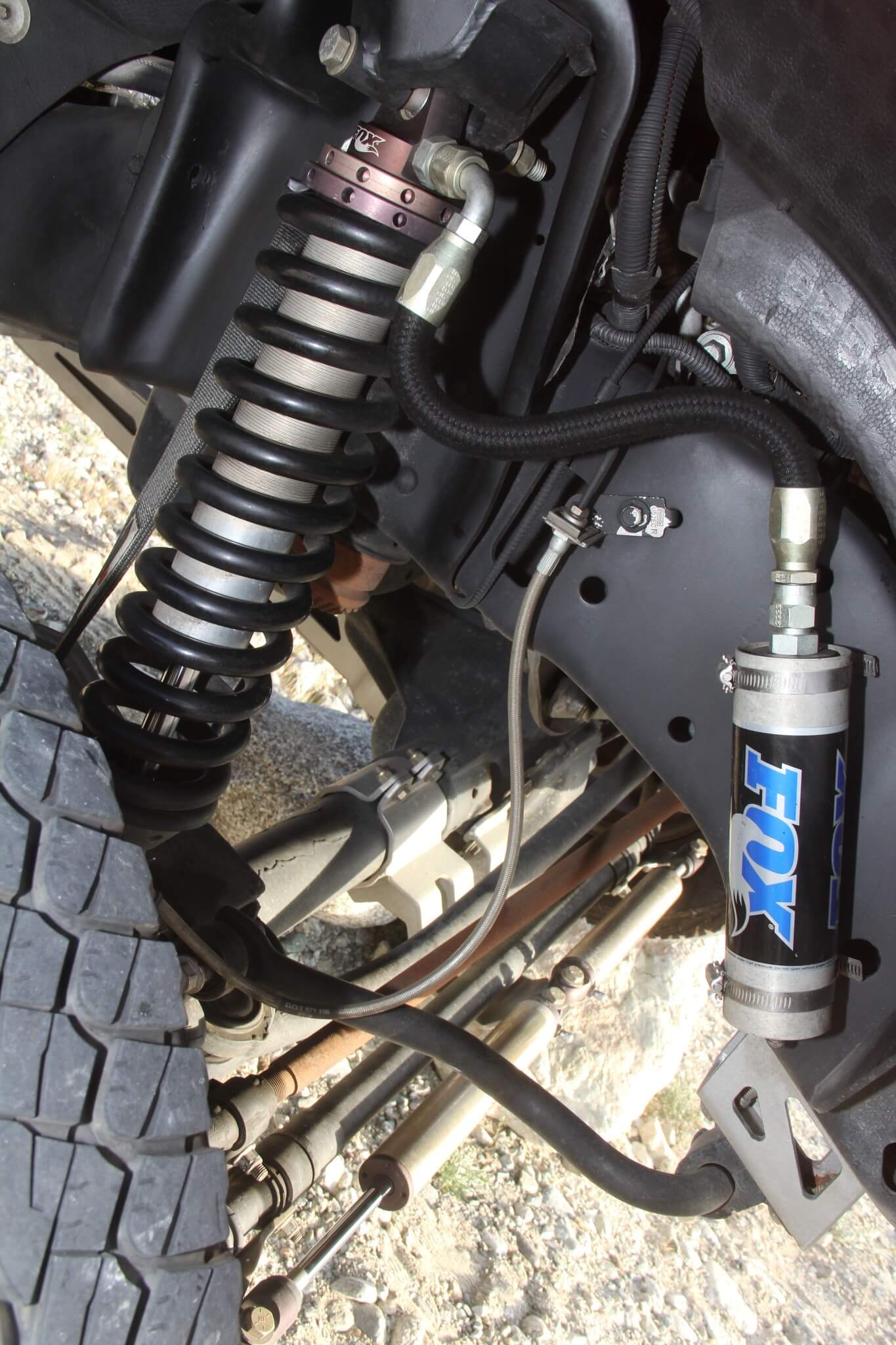 The Fox coil-over remote-reservoir shocks support and dampen the front suspension.