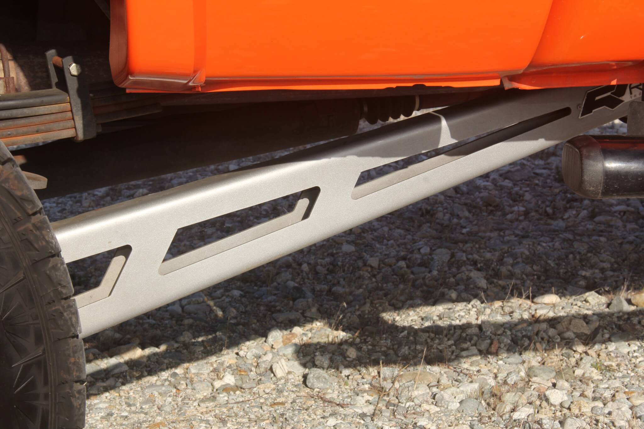 Axle wrap and wheel hop are eliminated by a pair of Rize full-floating rear traction bars. 